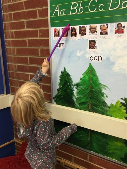 Student practicing the alphabet. 