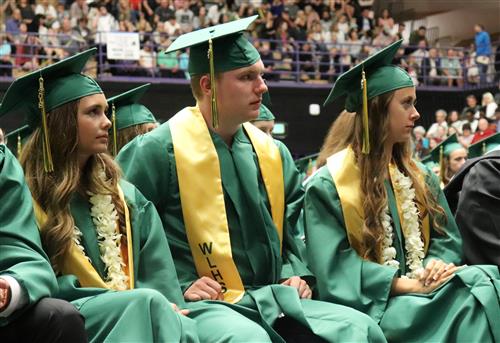 West Linn High School 2018 graduates prepare to receive their diplomas. 