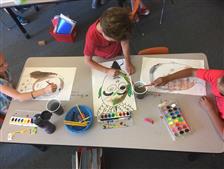 Students drawing self portraits. Students drawing self portraits.
