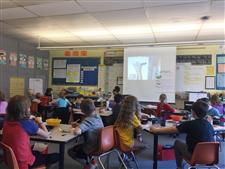 Student leading the class in a lesson. Student leading the class in a lesson.
