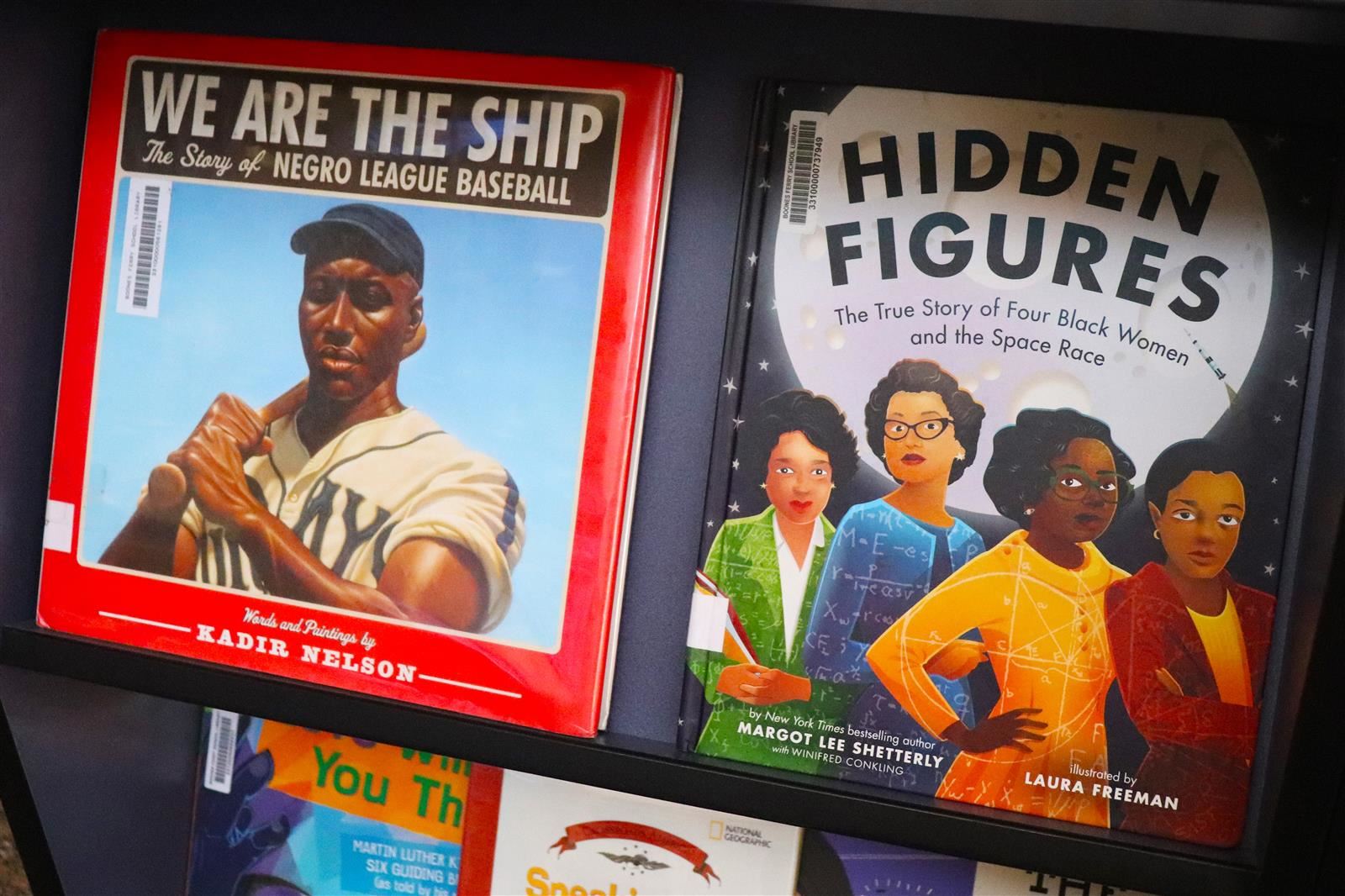 A picture of two books. One is titled "We are the Ship," and the other is titled, "Hidden Figures."