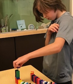 A Bolton Primary student participates in hands-on learning. 