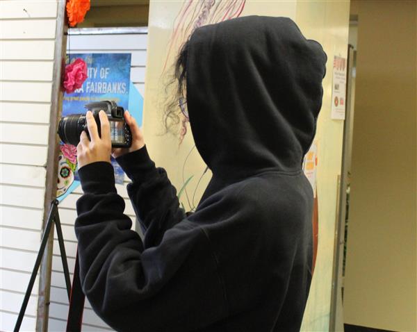Taking a photo during class